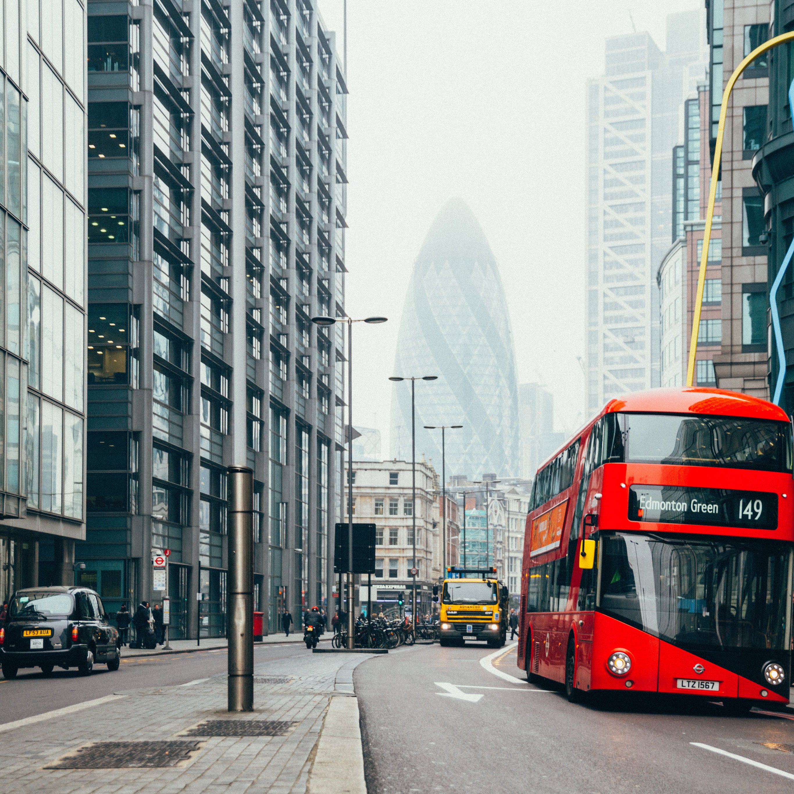 London scene with red but and taxi
